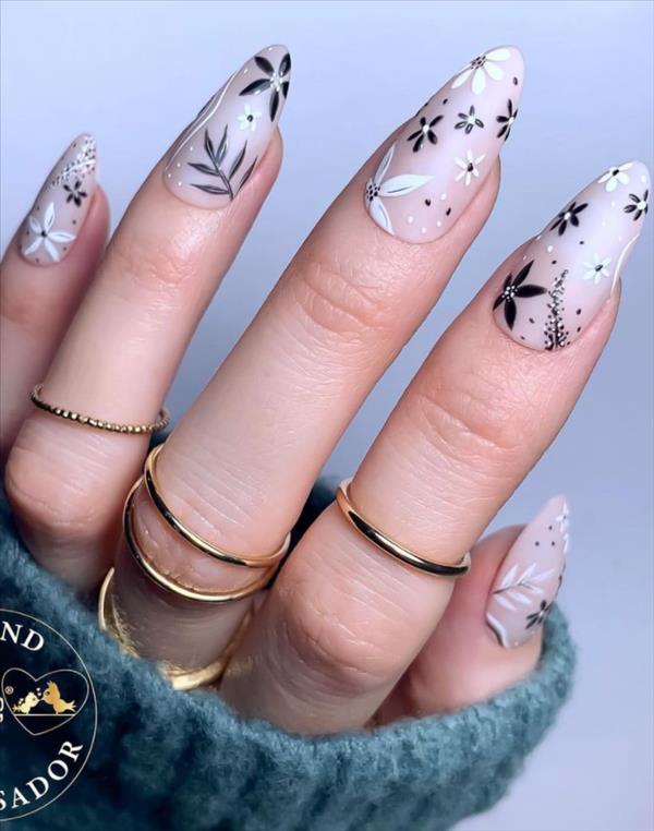 Nude almond nails with flowers