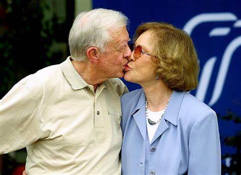 A heartwarming picture of Jimmy and Rosalynn Carter in their later years, still looking at each other with love and respect.