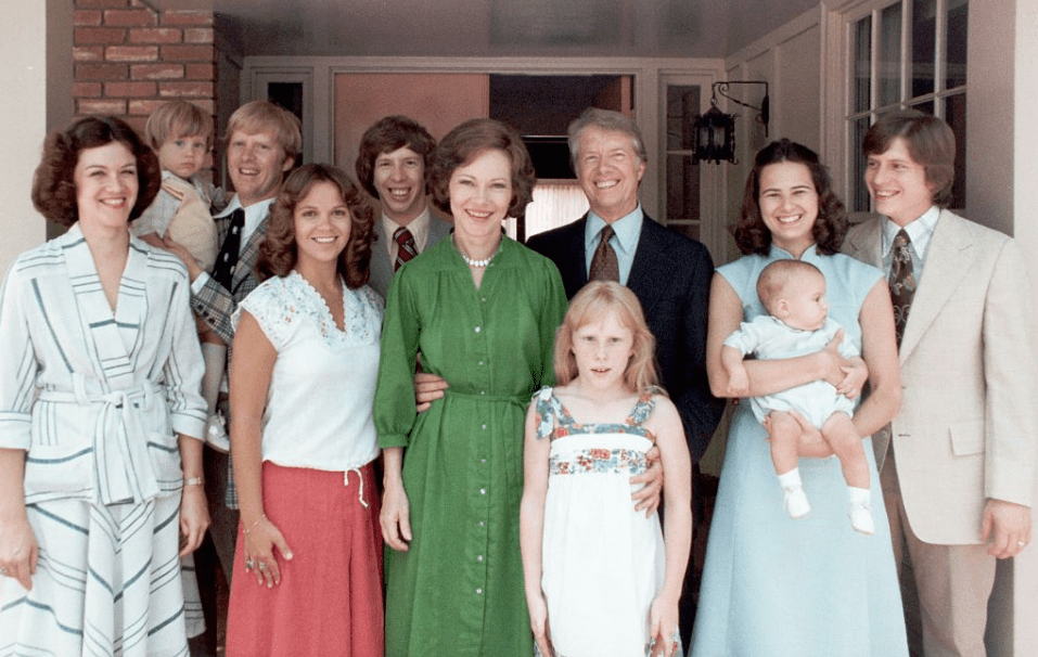 A photo of the Carters now, perhaps with their family, encapsulating their legacy of love and commitment.